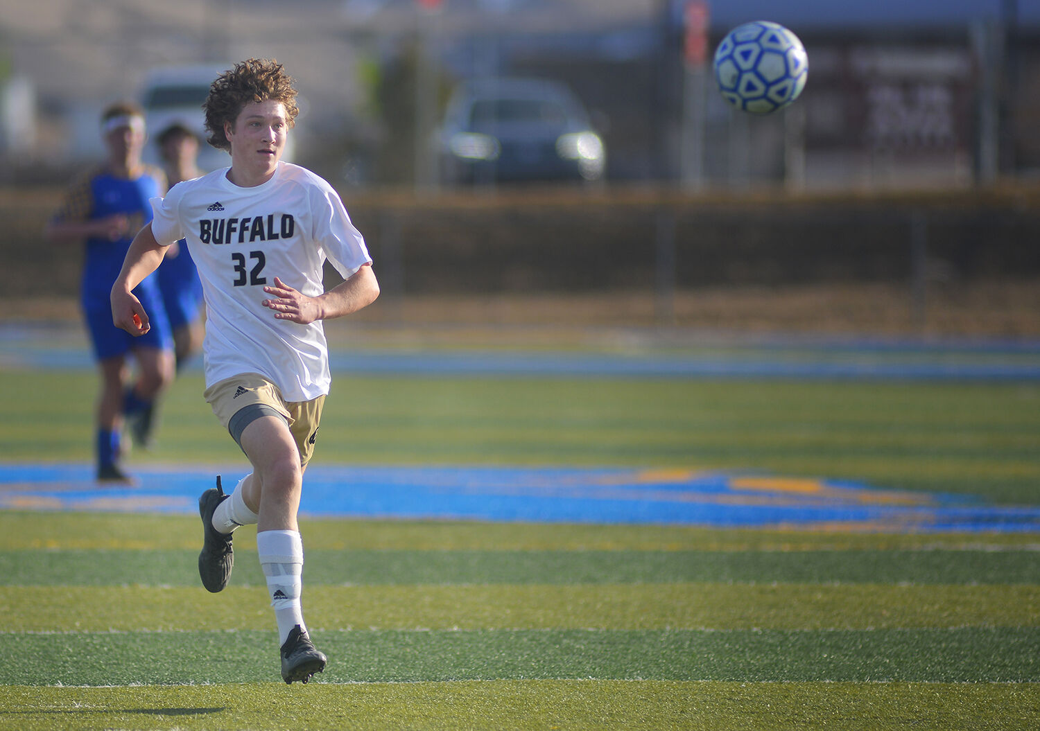 Calvin Rule sprints after the ball